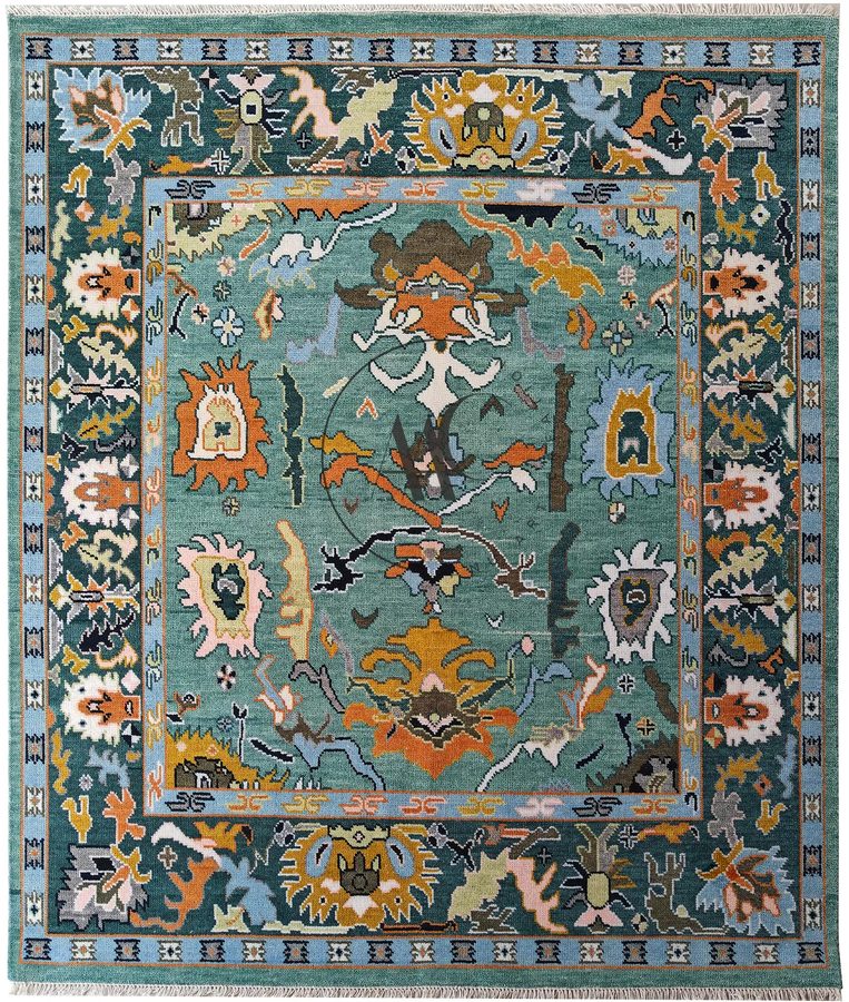 Teal Bazaar — hand-knotted rug with tribal medallions in orange, blush and mustard on teal